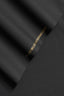Black fabric with a brand label on a black background